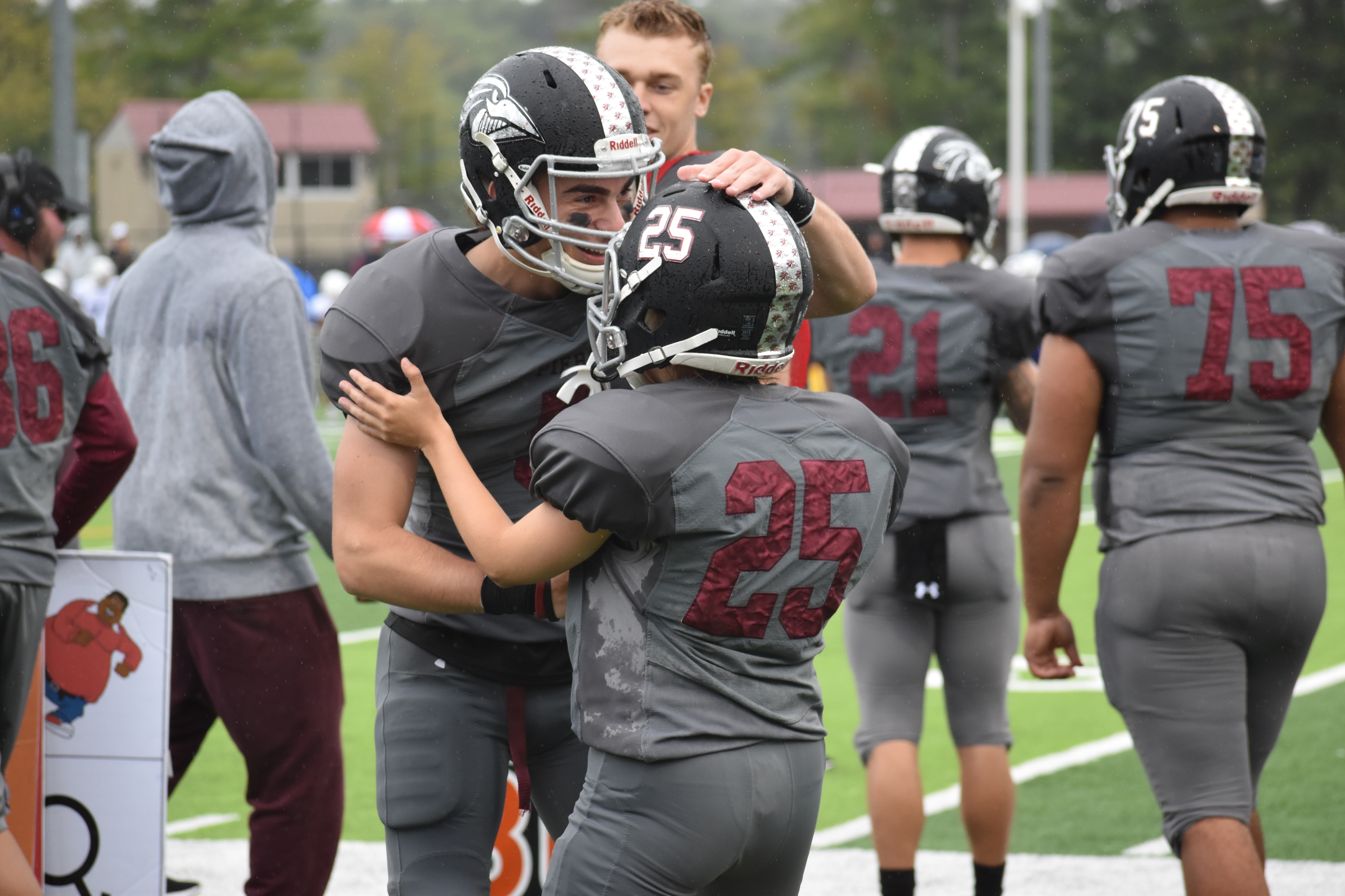 Morgan Smith celebrates after a PAT in Franklin Pierce's first-ever DII football victory.