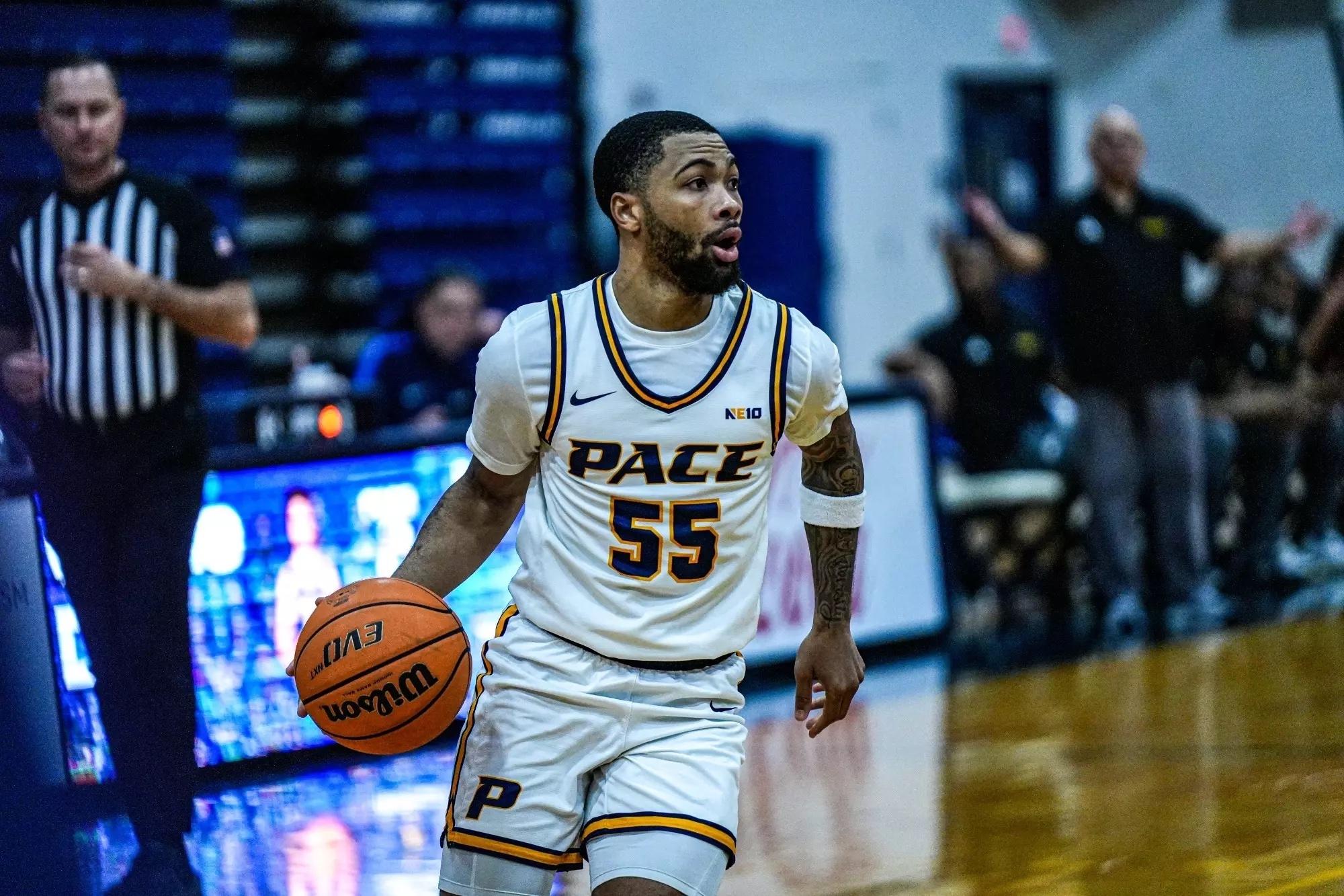 Tray Alexander drives to the hoop for Pace's DII men's basketball team. 