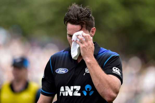 Mitchell McClenaghan of New Zealand walks from the field after being hit by the ball above the eye during their first ODI against Pakistan, at the Basin Reserve in Wellington, on January 25, 2016