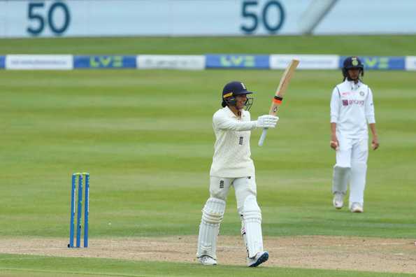 Sophia Dunkley made an unbeaten 74 to help England post a fighting total of 396 for 9.