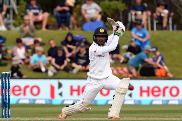 Chandimal, Karunaratne scored half-centuries to Sri Lanka to 197 for 4 on second day.