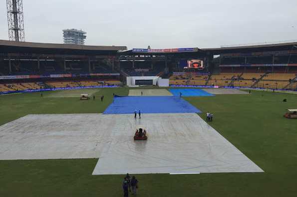 This is latest update from the stadium. Covers are on while there's a slight drizzle.