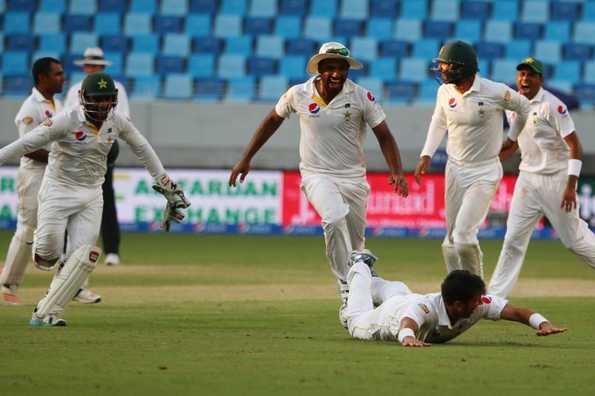 Pakistan overcame England's defiance with just under seven overs to spare on the final day of the Dubai Test.