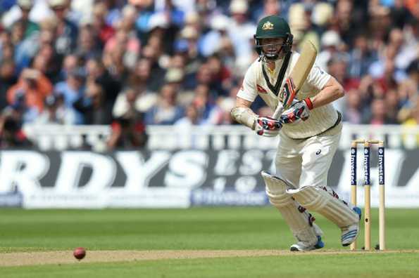 Chris Rogers watches the ball after playing a shot on the first day of the third Ashes cricket Test.