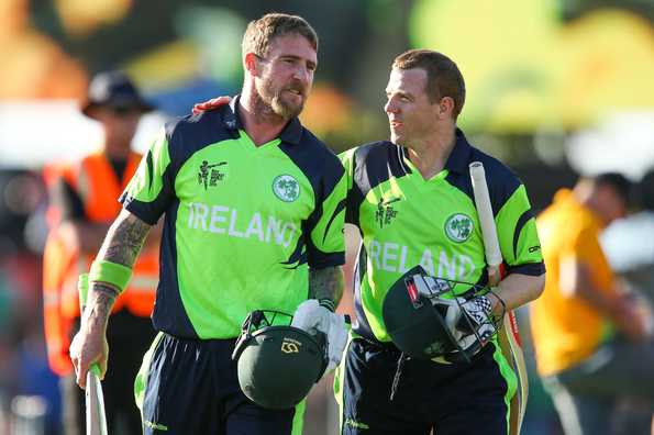 Ireland players celebrate after their four-wicket win over West Indies.