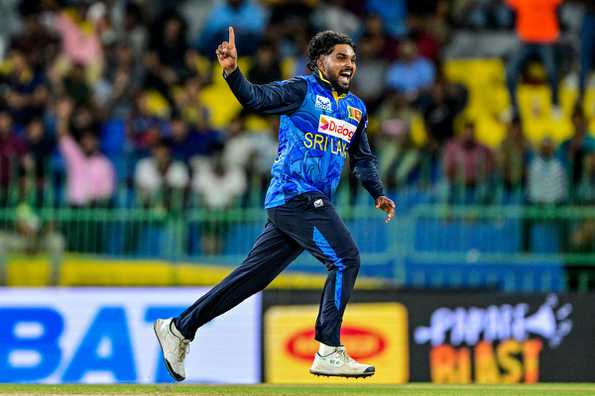 Hasaranga celebrates a wicket