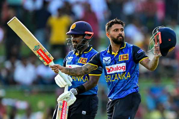 Kusal Mendis celebrates his century 