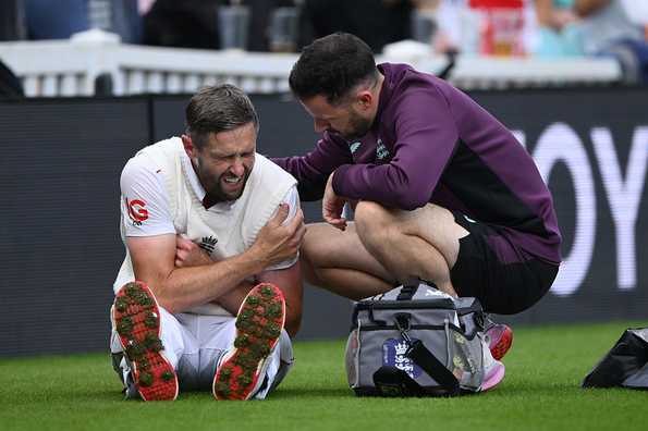Chris Woakes hurt his left shoulder after landing awkwardly on a dive he put in on Day 1 at the Oval