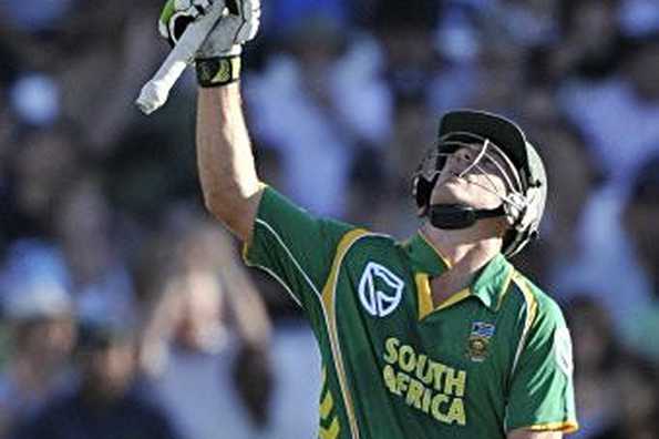 South African batsman AB de Villiers raises his bat to celebrate scoring a half-century during the ODI (One-Day International) match between Australia and South Africa at Newlands stadium in Cape Town, South Africa. South Africa won by 25 runs.