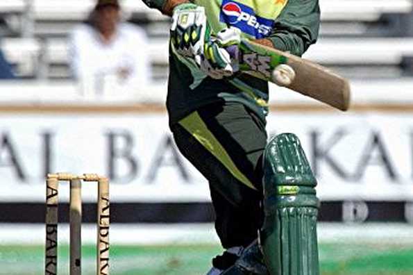 Pakistani cricketer Shoaib Khan hits the ball during their match against Zimbabwe of the T20 tournament in King City, on the outskirts of Toronto. Pakistan defeated Zimbabwe by seven wickets.