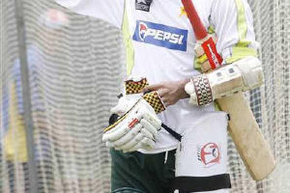 Pakistan's Mohammad Yousuf waves at his teammates as he leaves the field after cricket practice in Dhaka in this June 13, 2008 file photo. REUTERS/Rafiqur Rahman