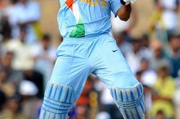 Indian captain Mahendra Singh Dhoni plays a stroke during the second one day match against Sri Lanka in Dambulla. Dhoni capped Zaheer Khan's devastating spell with a crucial 39 as India posted a tense three-wicket win over Sri Lanka in the second one-day international.