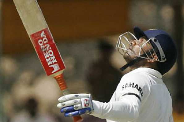 India's Virender Sehwag looks up after reaching 200 runs in his innings against Sri Lanka during their second test cricket match in Galle, August 1, 2008. REUTERS/Anuruddha Lokuhapuarachchi/Files