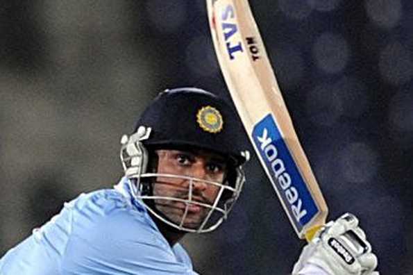 Indian cricket team captain Mahendra Singh Dhoni plays a stroke during the Super League Asia Cup match between India and Sri Lanka at National stadium in Karachi. India beat Sri Lanka by six wickets in the Super League match to reach the final of the Asia Cup.